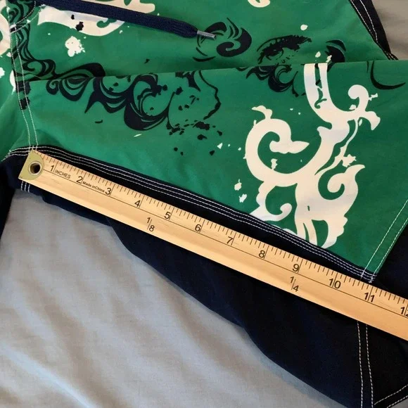Genesis Surf Board Shorts Mens 34 Green Floral Face Graphic Swim Trunks Beach - Picture 6 of 10